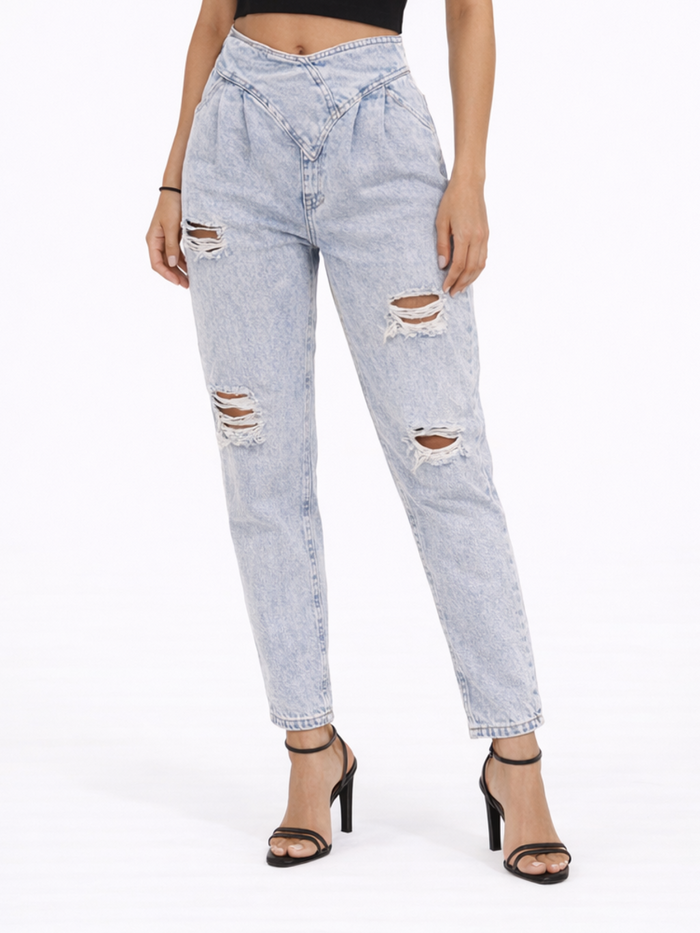 Light blue distressed jeans with a high waist and ripped details, paired with black strappy heels.